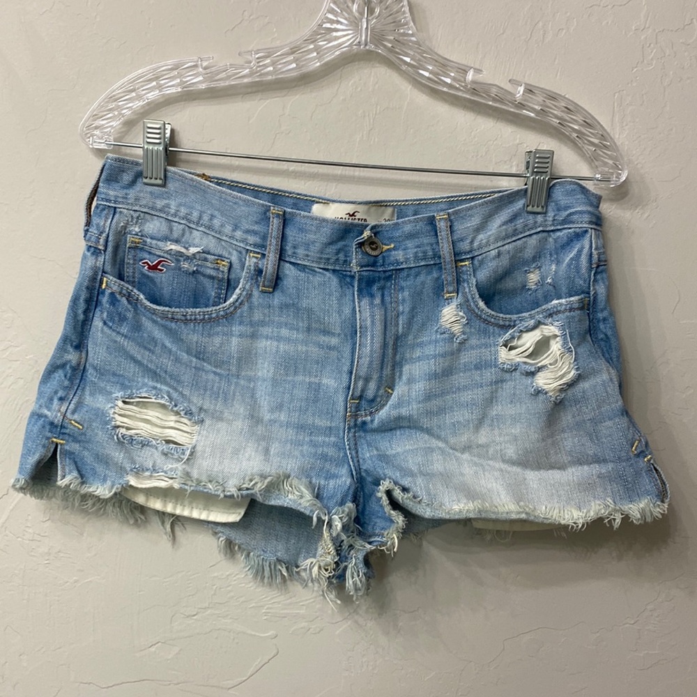 Hollister distressed raw hem denim shorts size 29. Light wash